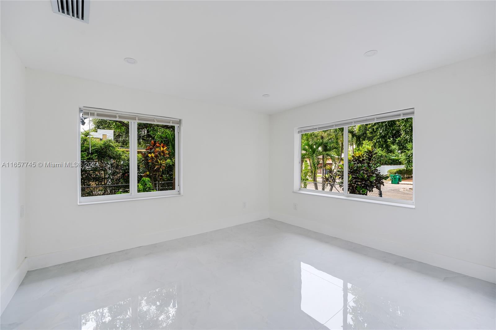 4802 Northwest 11th Avenue Miami, FL 33127 - Photo 21 of 26 a view of an empty room with a window