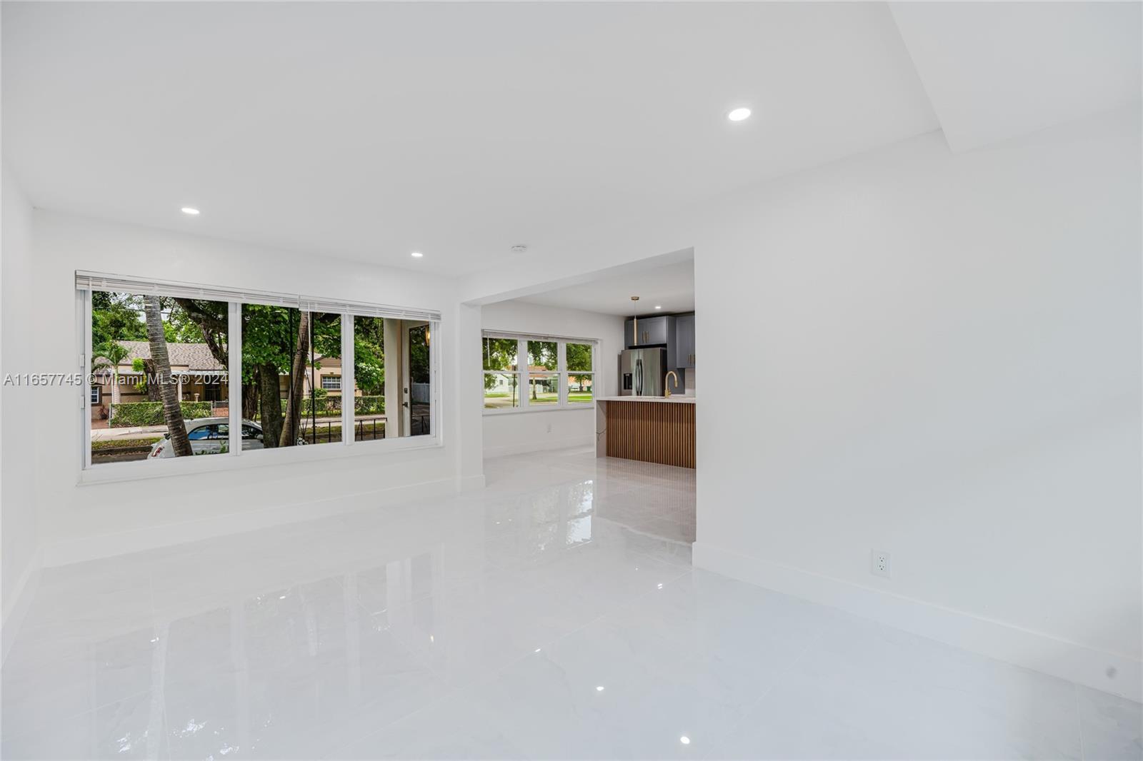 4802 Northwest 11th Avenue Miami, FL 33127 - Photo 9 of 26 a view of an empty room with a window