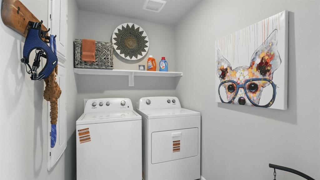 3004 McCormick Street Denton, TX 76205 - Photo 31 of 35 a utility room with dryer and washer