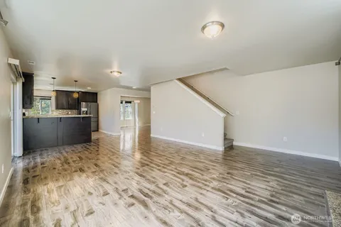 a view of kitchen with cabinets