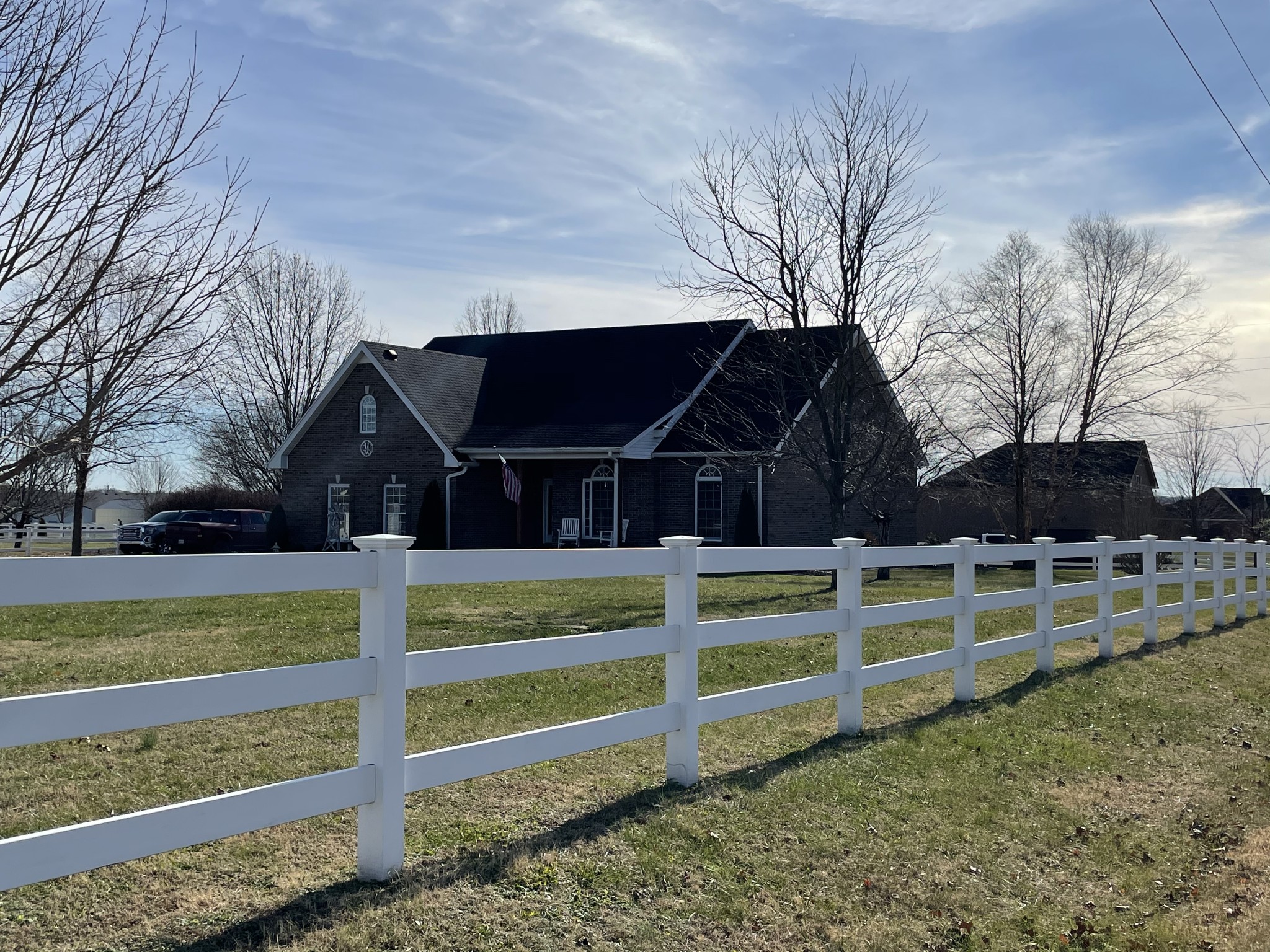 3387 Kinneys Road Cedar Hill, TN 37032 - Photo 1 of 43 a view of a yard with wooden fence and large trees