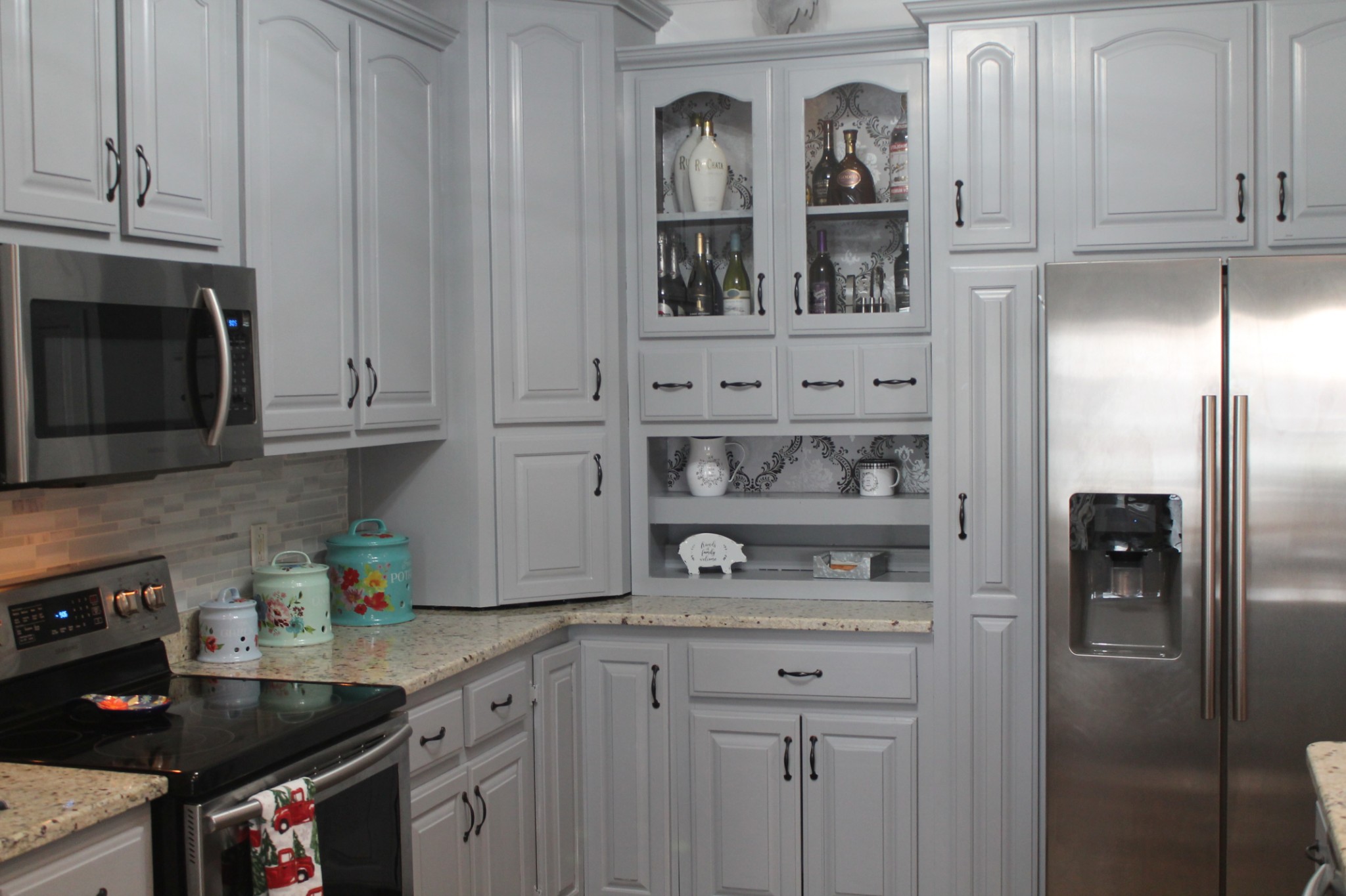 3387 Kinneys Road Cedar Hill, TN 37032 - Photo 15 of 43 a kitchen with stainless steel appliances granite countertop a refrigerator a stove and a cabinets