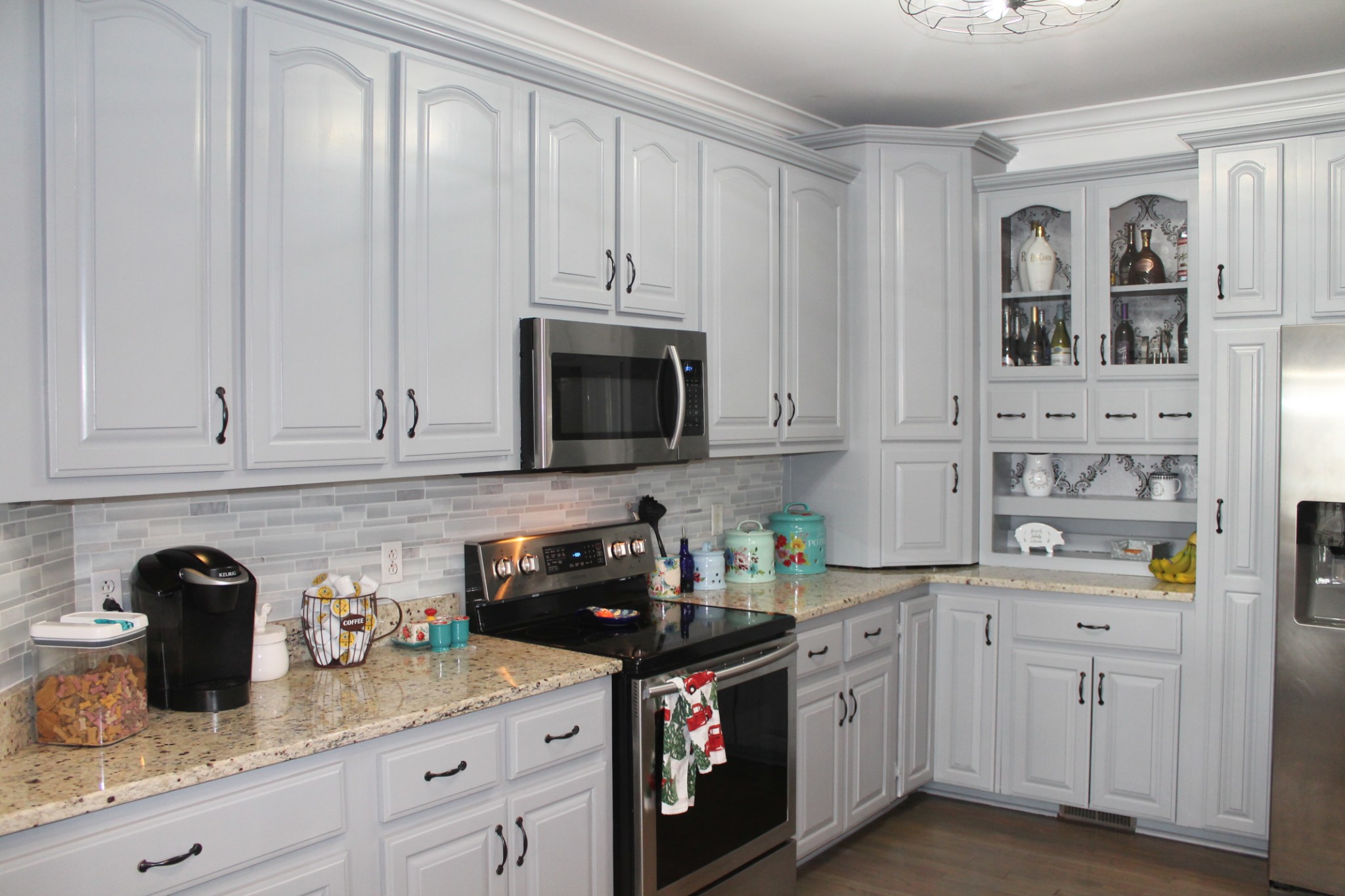 3387 Kinneys Road Cedar Hill, TN 37032 - Photo 17 of 43 a kitchen with white cabinets and sink