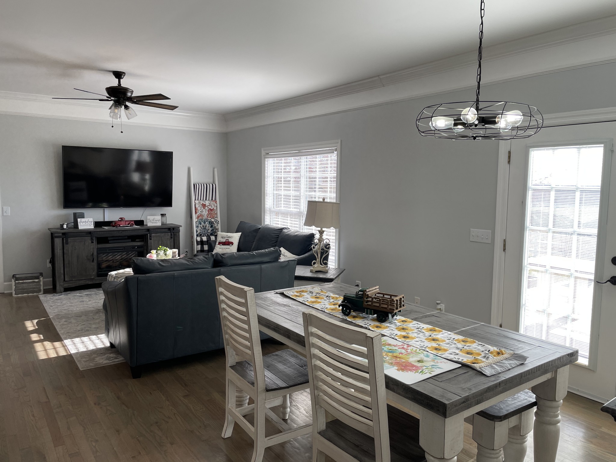 3387 Kinneys Road Cedar Hill, TN 37032 - Photo 20 of 43 a living room with furniture a flat screen tv and a window