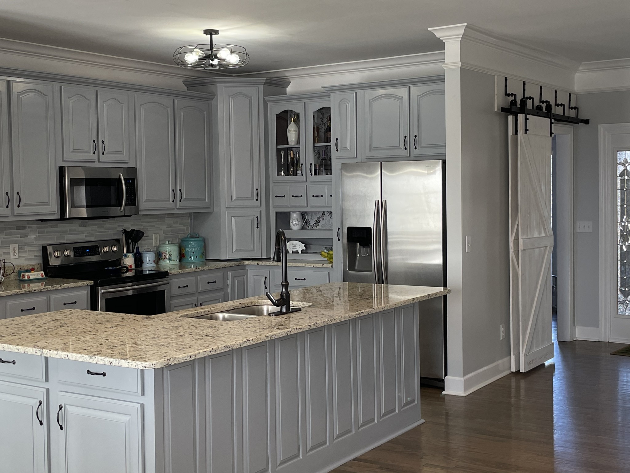 3387 Kinneys Road Cedar Hill, TN 37032 - Photo 21 of 43 a kitchen with stainless steel appliances granite countertop a refrigerator a stove and a sink