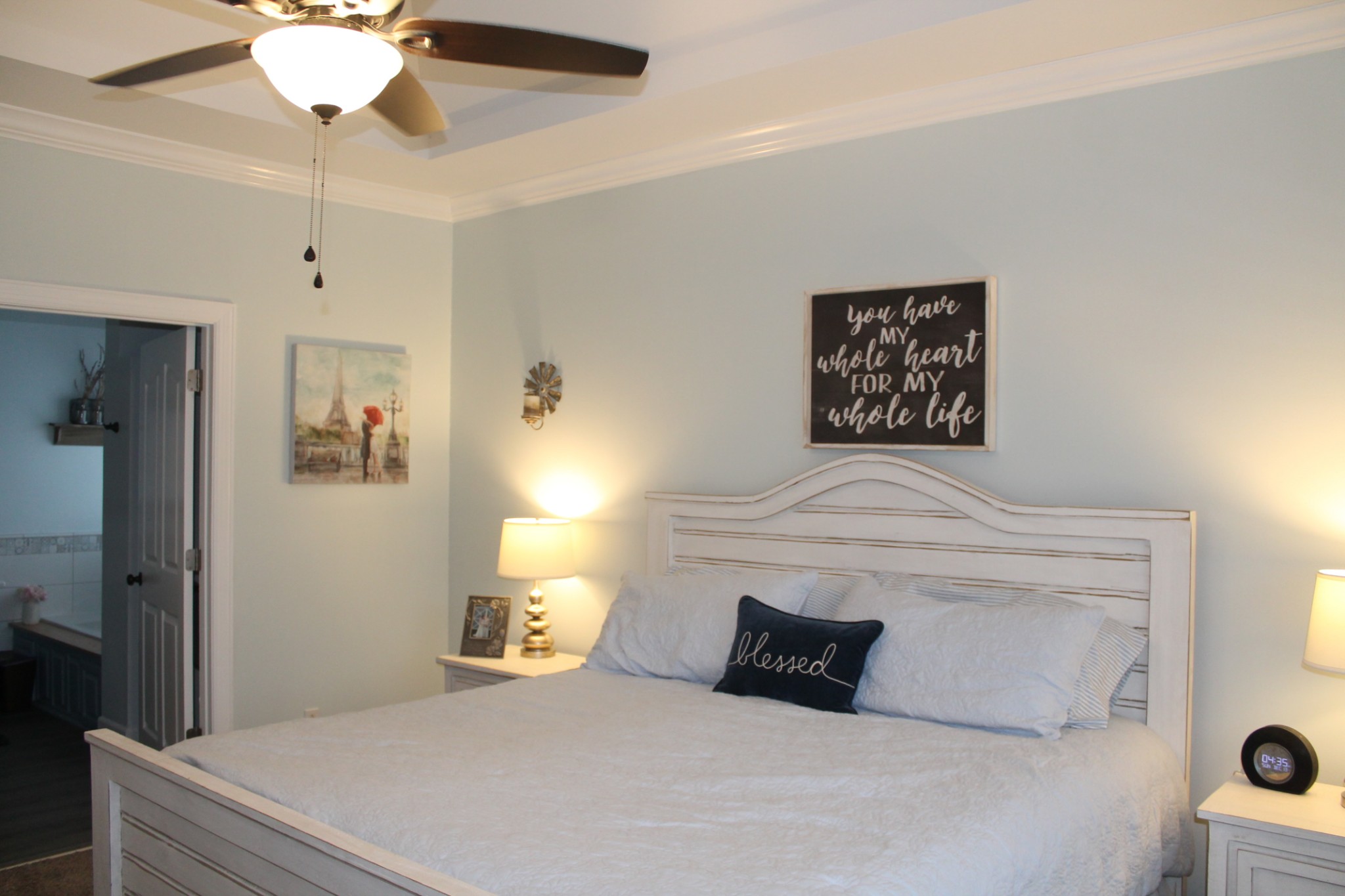 3387 Kinneys Road Cedar Hill, TN 37032 - Photo 23 of 43 a bedroom with a bed and a chandelier