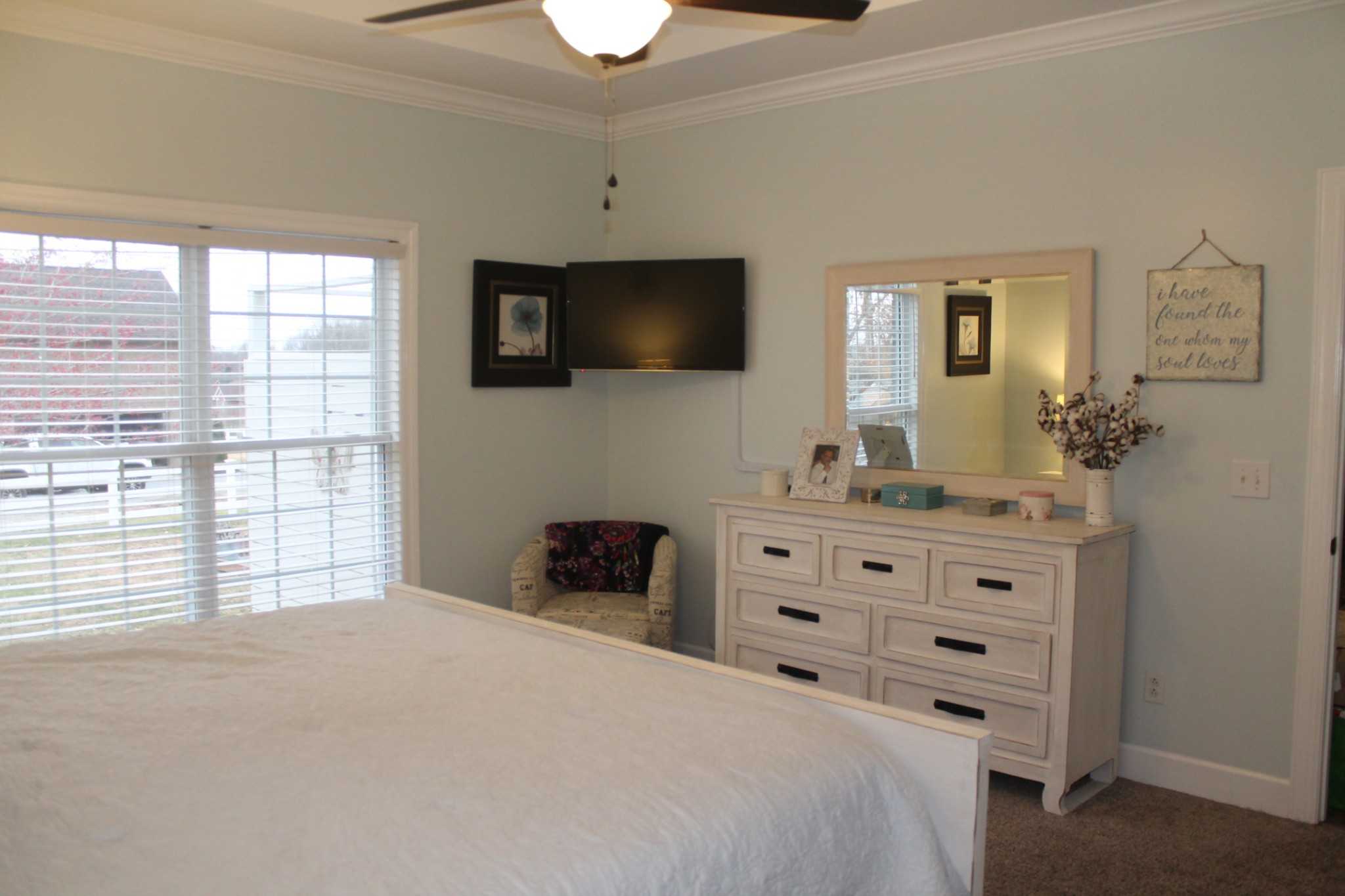 3387 Kinneys Road Cedar Hill, TN 37032 - Photo 26 of 43 a bedroom with a bed and a flat screen tv