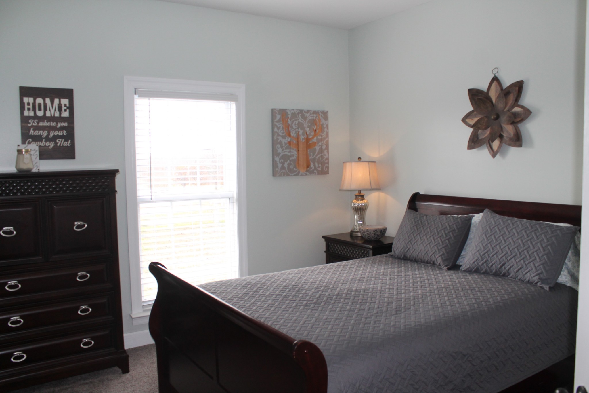 3387 Kinneys Road Cedar Hill, TN 37032 - Photo 30 of 43 a bedroom with a bed and a window