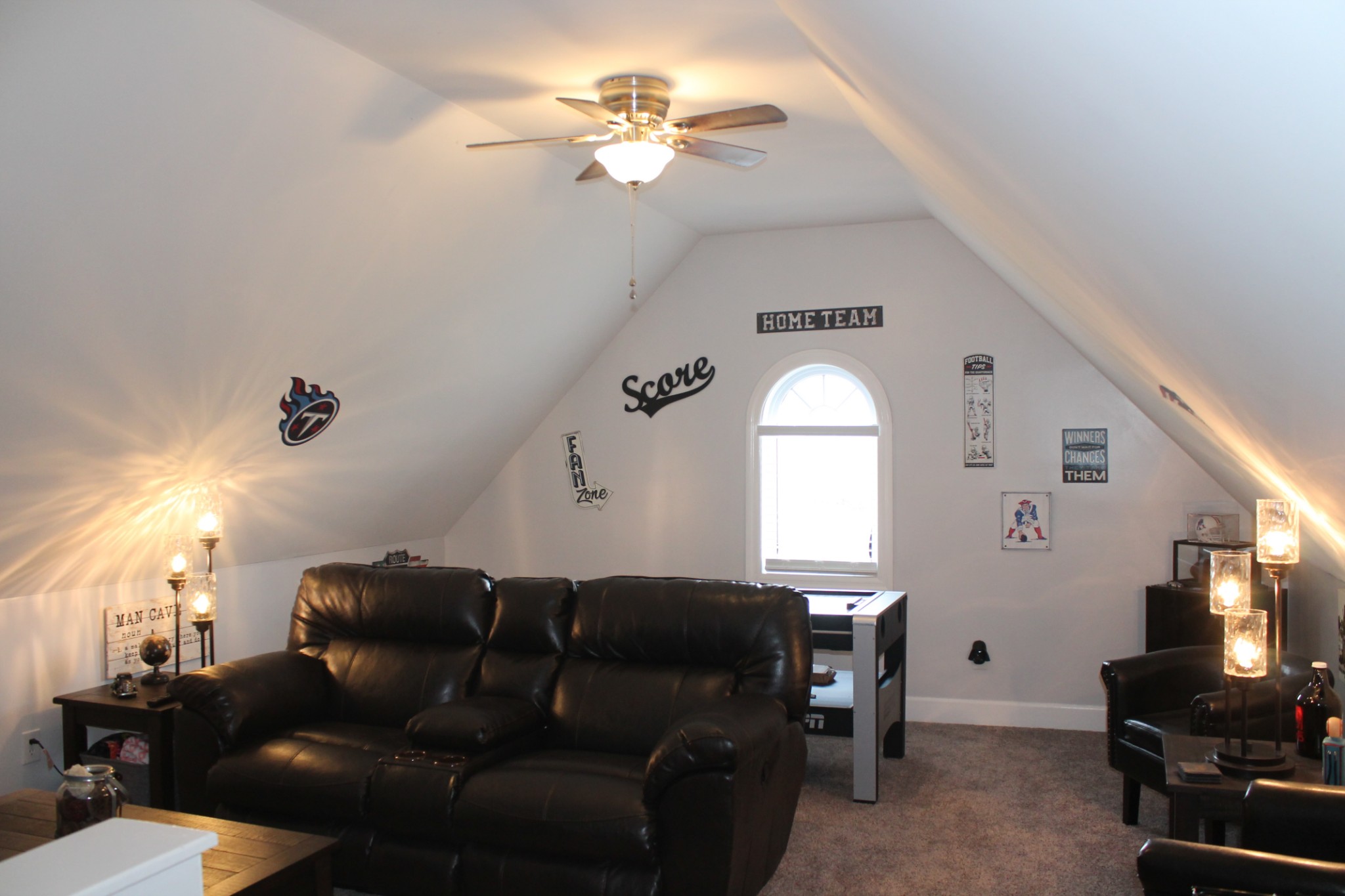 3387 Kinneys Road Cedar Hill, TN 37032 - Photo 36 of 43 a living room with furniture a fireplace and a chandelier