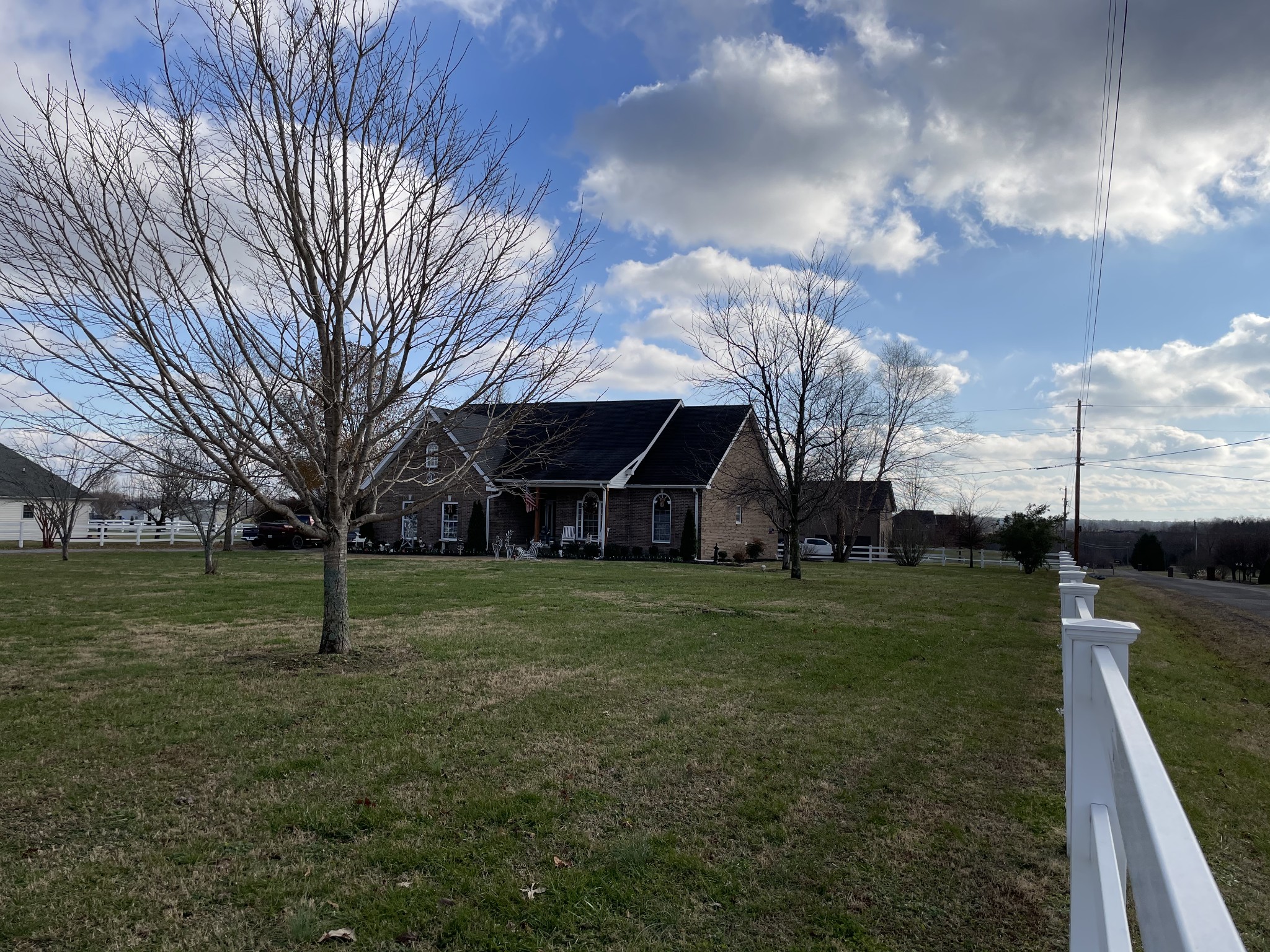 3387 Kinneys Road Cedar Hill, TN 37032 - Photo 10 of 43 a view of a house with a yard