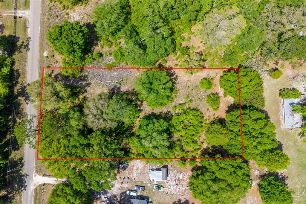 Tbd Southwest 52nd Terrace Lake Butler, FL 32054 - Photo 2 of 7 an aerial view of residential house with outdoor space and trees all around