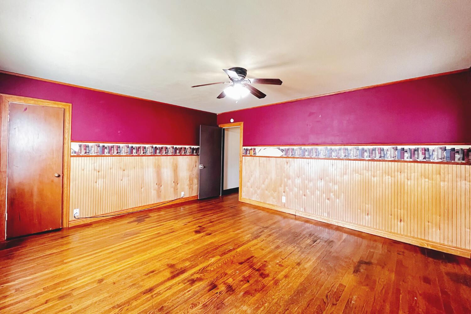 3002 21st Street Lubbock, TX 79410 - Photo 13 of 41 a view of an empty room with window and a ceiling fan