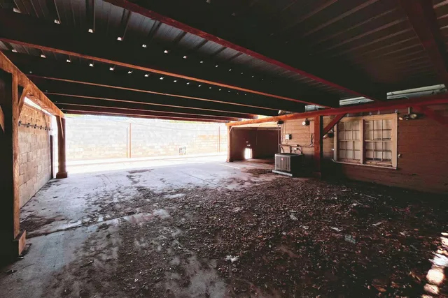 a kitchen with a sink and a refrigerator