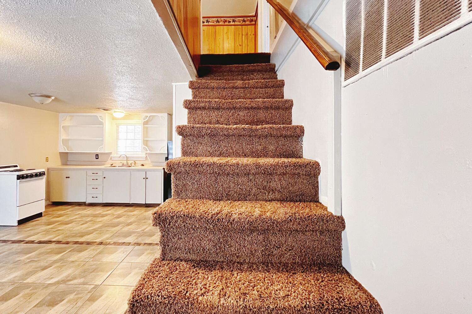 3002 21st Street Lubbock, TX 79410 - Photo 37 of 41 a view of entryway and hall with wooden floor