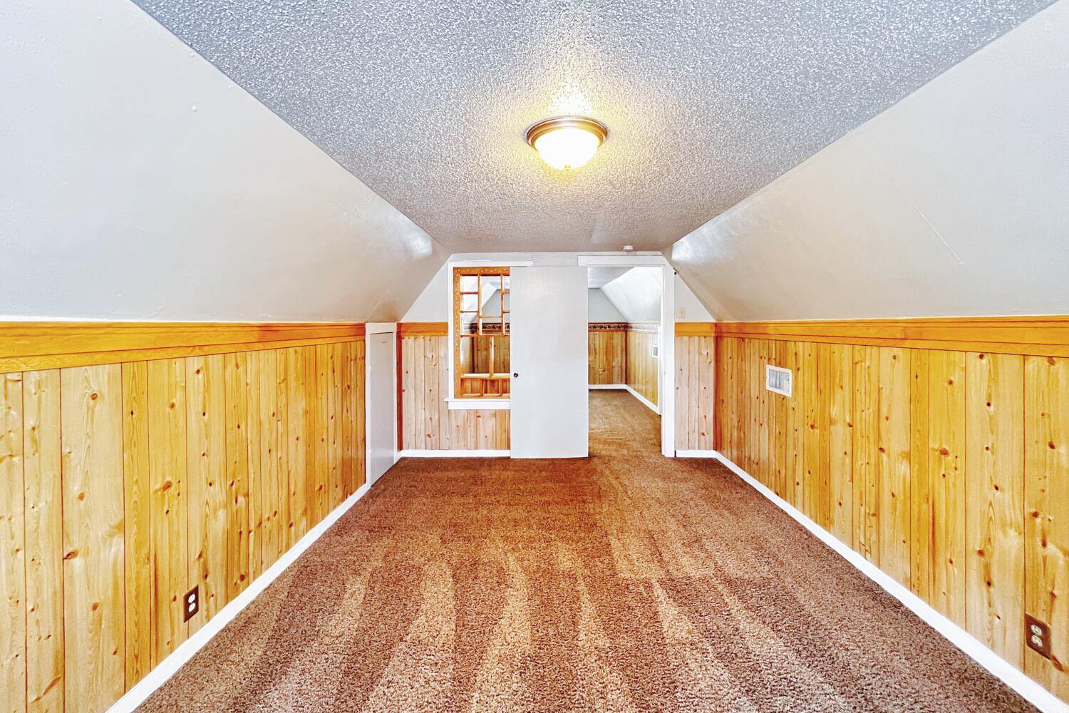 3002 21st Street Lubbock, TX 79410 - Photo 41 of 41 a view of a big room with wooden floor and windows