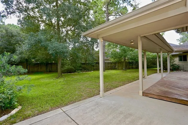 a view of a house with backyard