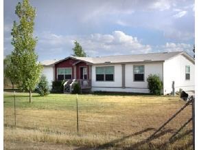 1495 Ranch House Road Paulden, AZ 86334 - Photo 1 of 1 a front view of a house with a yard