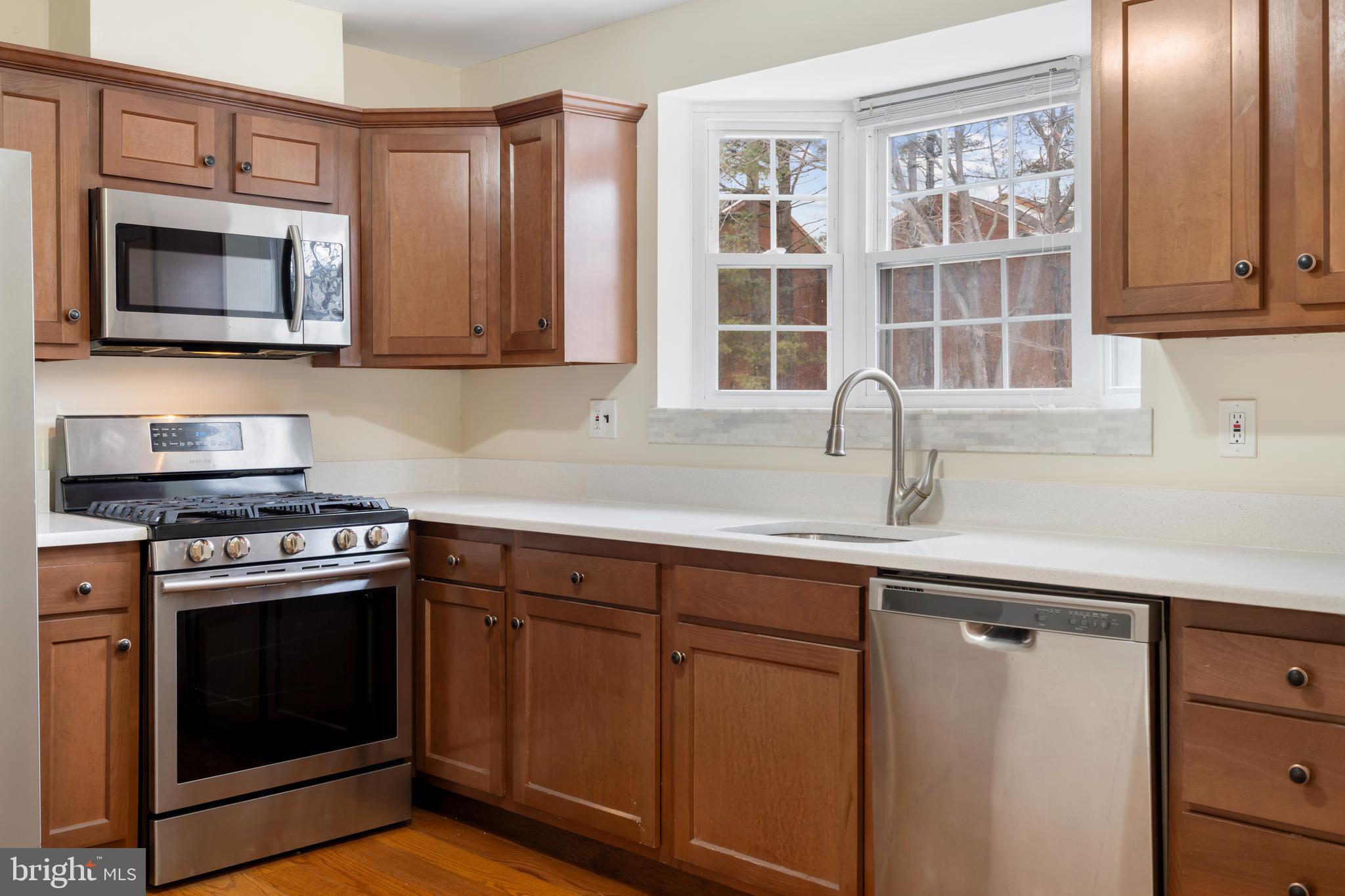 19 Spring Glen Court Cockeysville, MD 21030 - Photo 8 of 38 Updated wood cabinets, and quartz counters