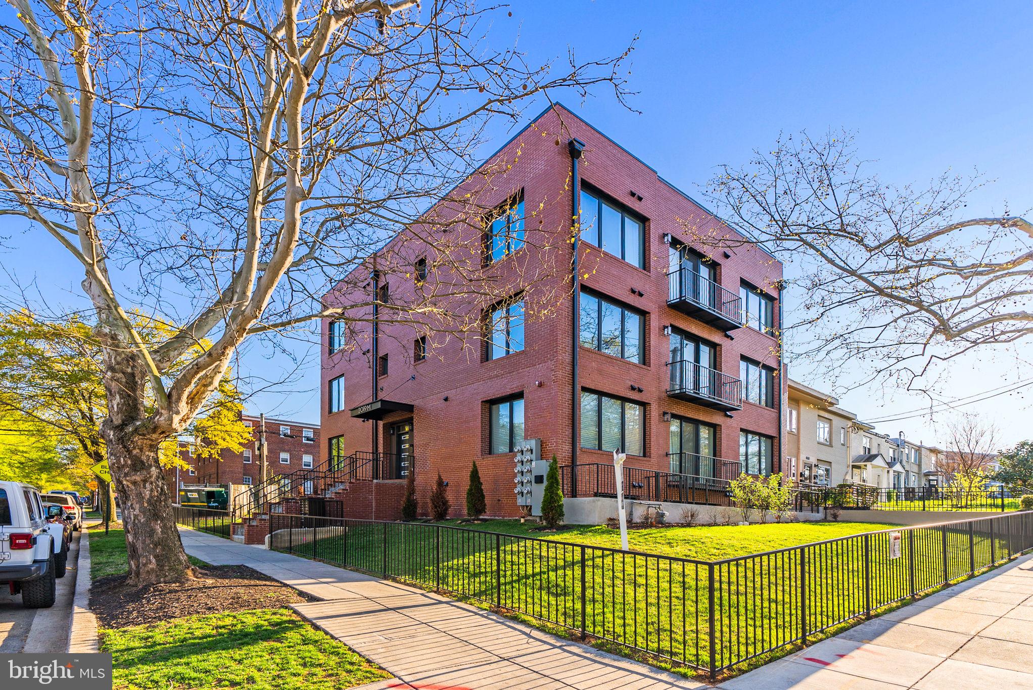 2019 M Street Northeast, Unit 1 Washington, DC 20002 - Photo 1 of 31 a front view of a building with garden