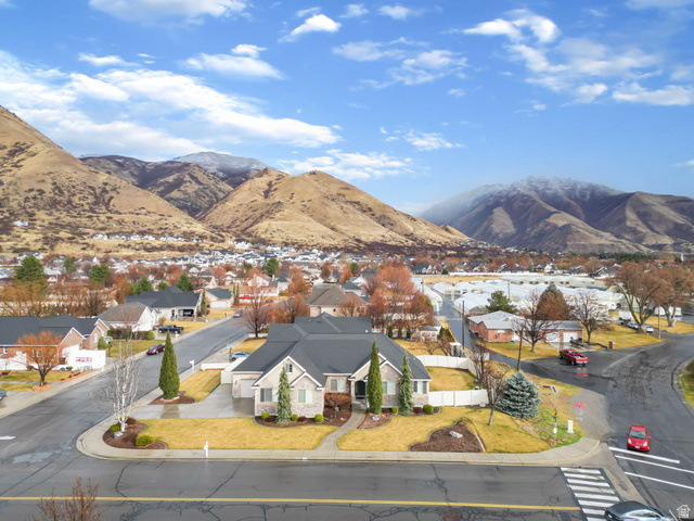 557 South 1470th Street East Springville, UT 84663 - Photo 1 of 46 View of mountain backdrop featuring nearby suburban area