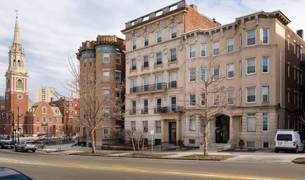 a view of a building and a street