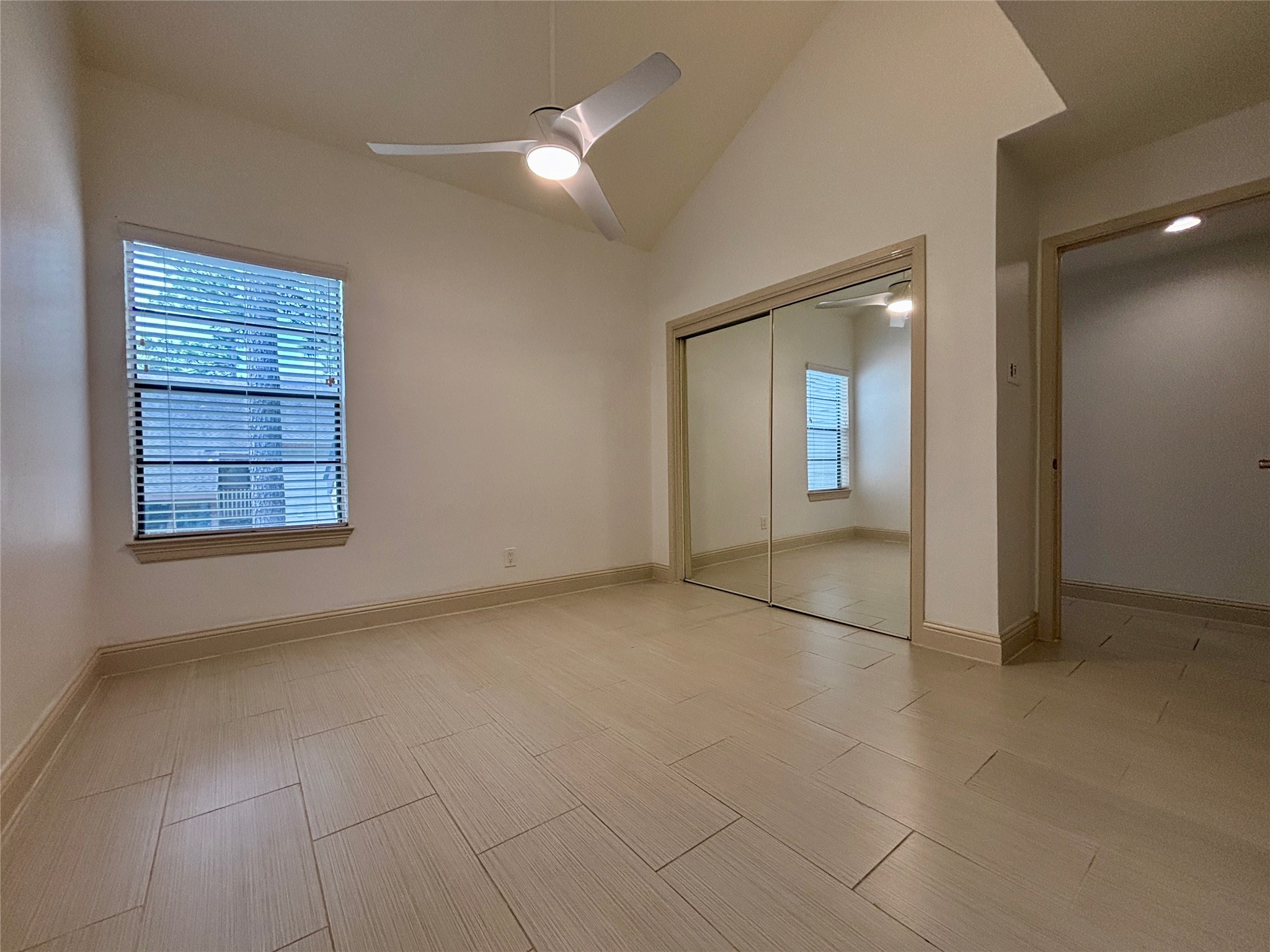 12900 Walden Road, Unit 508E Montgomery, TX 77356 - Photo 13 of 25 an empty room with windows and entrance