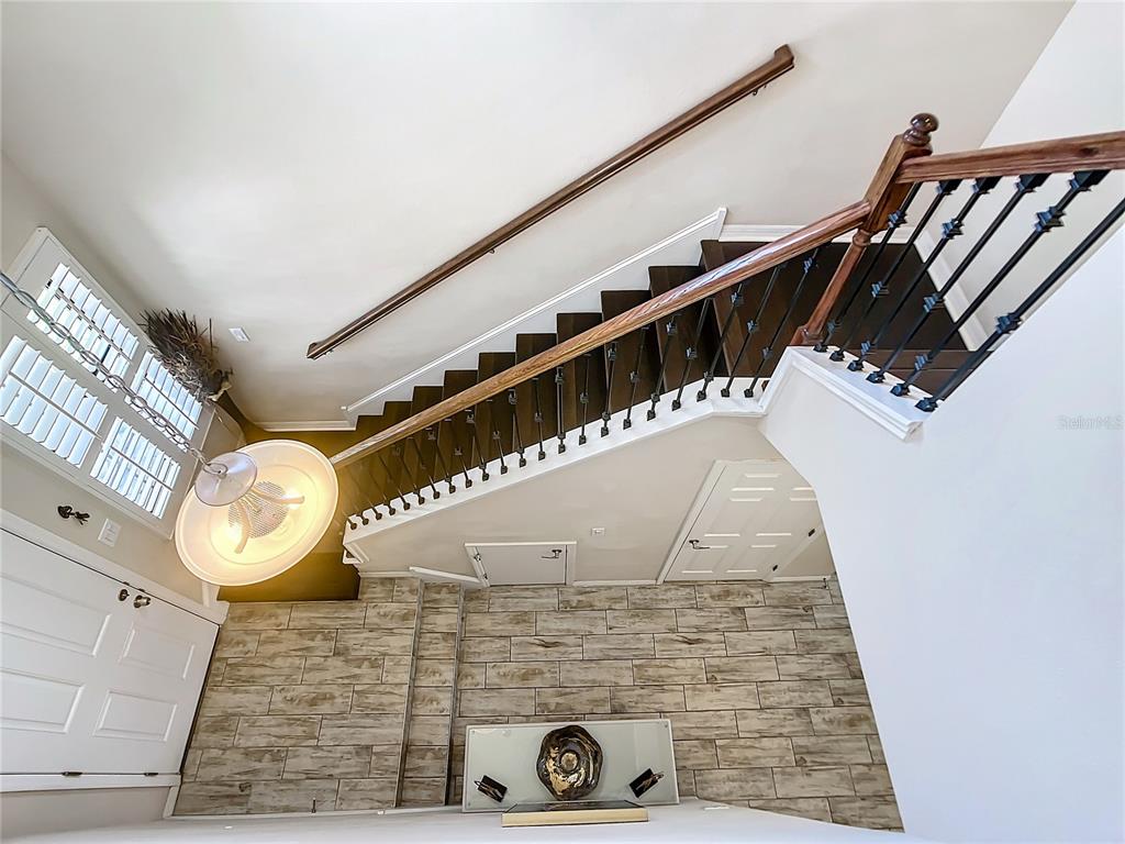 4744 Wandering Way Wesley Chapel, FL 33544 - Photo 29 of 39 a view of staircase with white walls