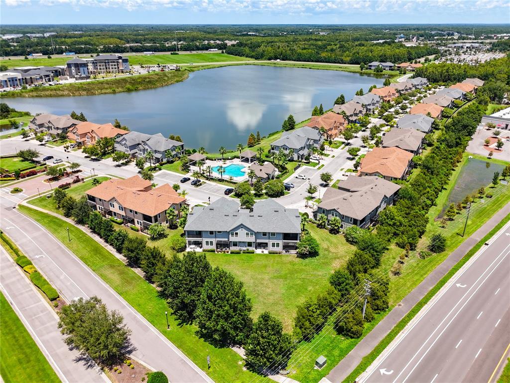 4744 Wandering Way Wesley Chapel, FL 33544 - Photo 37 of 39 a view of a lake with a lake