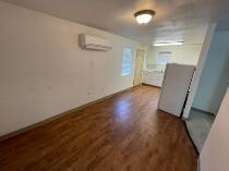 3014 22nd Street Lubbock, TX 79410 - Photo 19 of 23 an empty room with wooden floor and windows