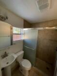 3014 22nd Street Lubbock, TX 79410 - Photo 21 of 23 a bathroom with a toilet and a shower