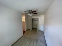 3014 22nd Street Lubbock, TX 79410 - Photo 23 of 23 a view of a livingroom with a ceiling fan and window