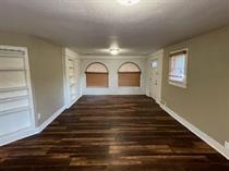 3014 22nd Street Lubbock, TX 79410 - Photo 7 of 23 a view of entryway and hall with wooden floor
