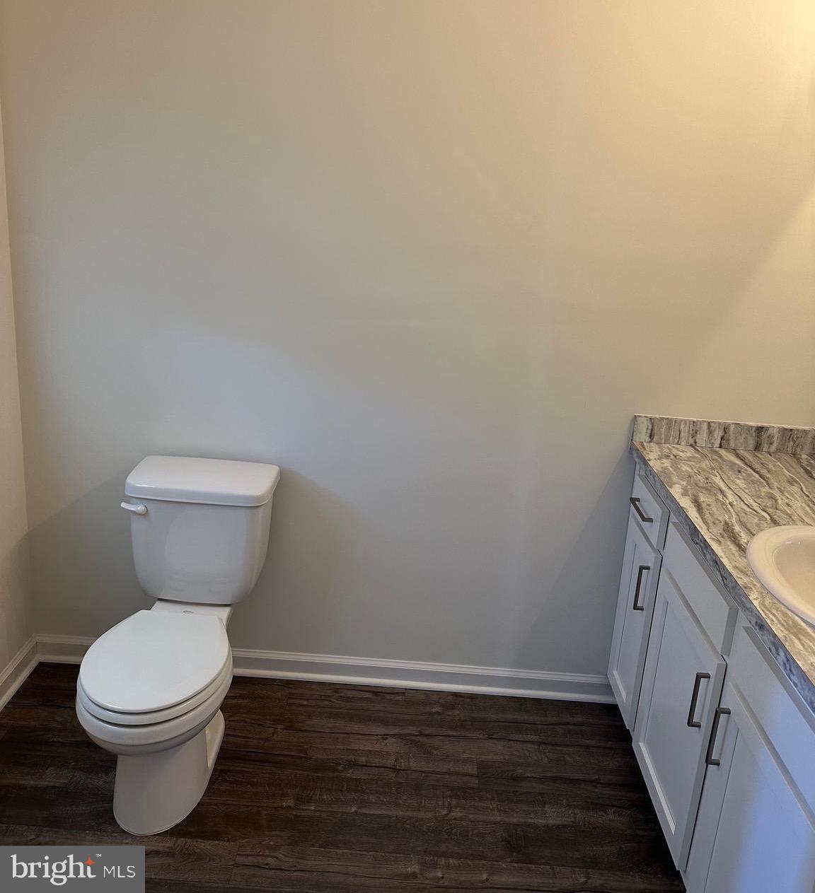 78 Tansboro Road Berlin, NJ 08009 - Photo 10 of 24 a bathroom with a granite countertop toilet and a sink