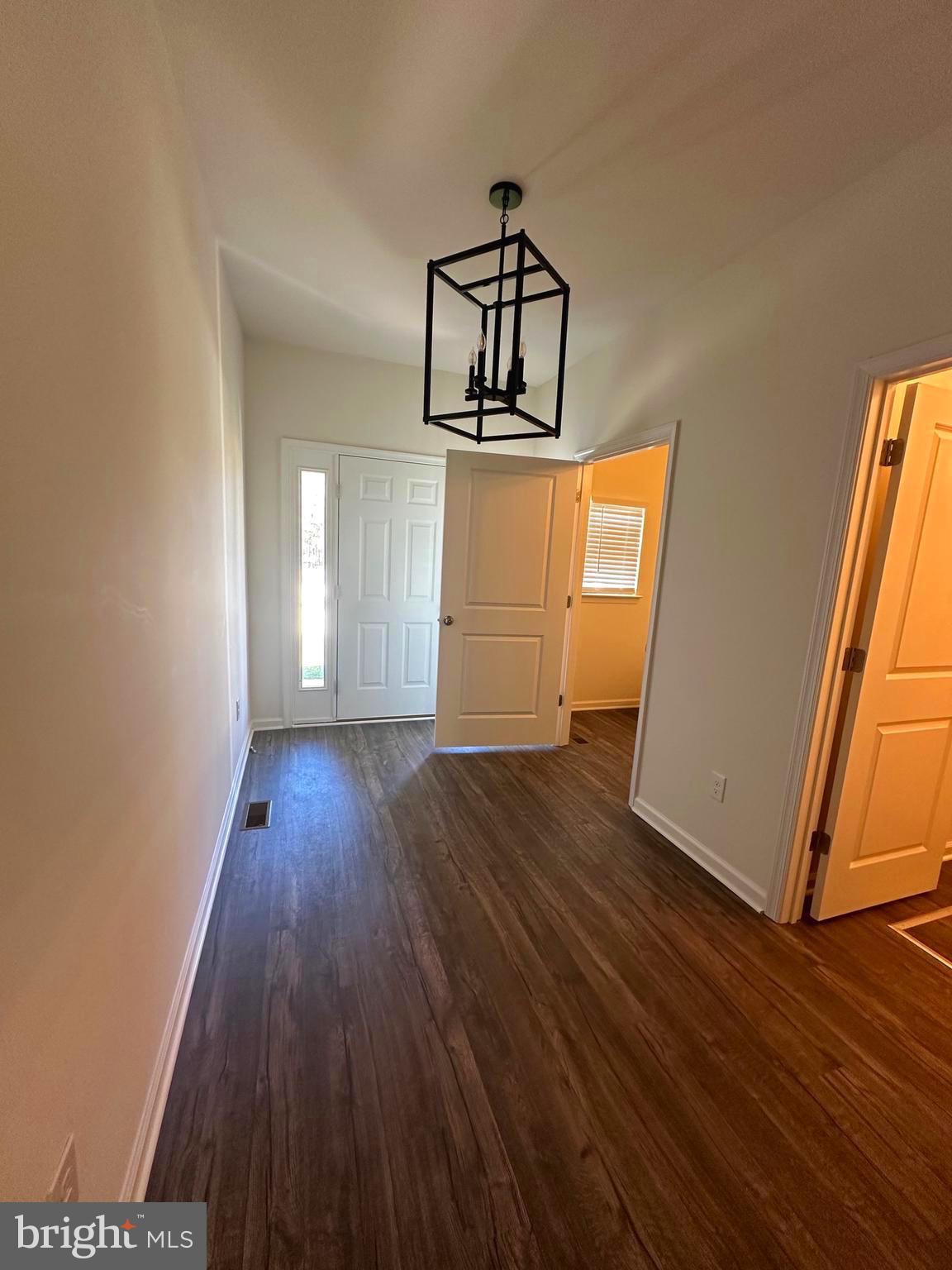 78 Tansboro Road Berlin, NJ 08009 - Photo 5 of 24 a view of a room with wooden floor and staircase