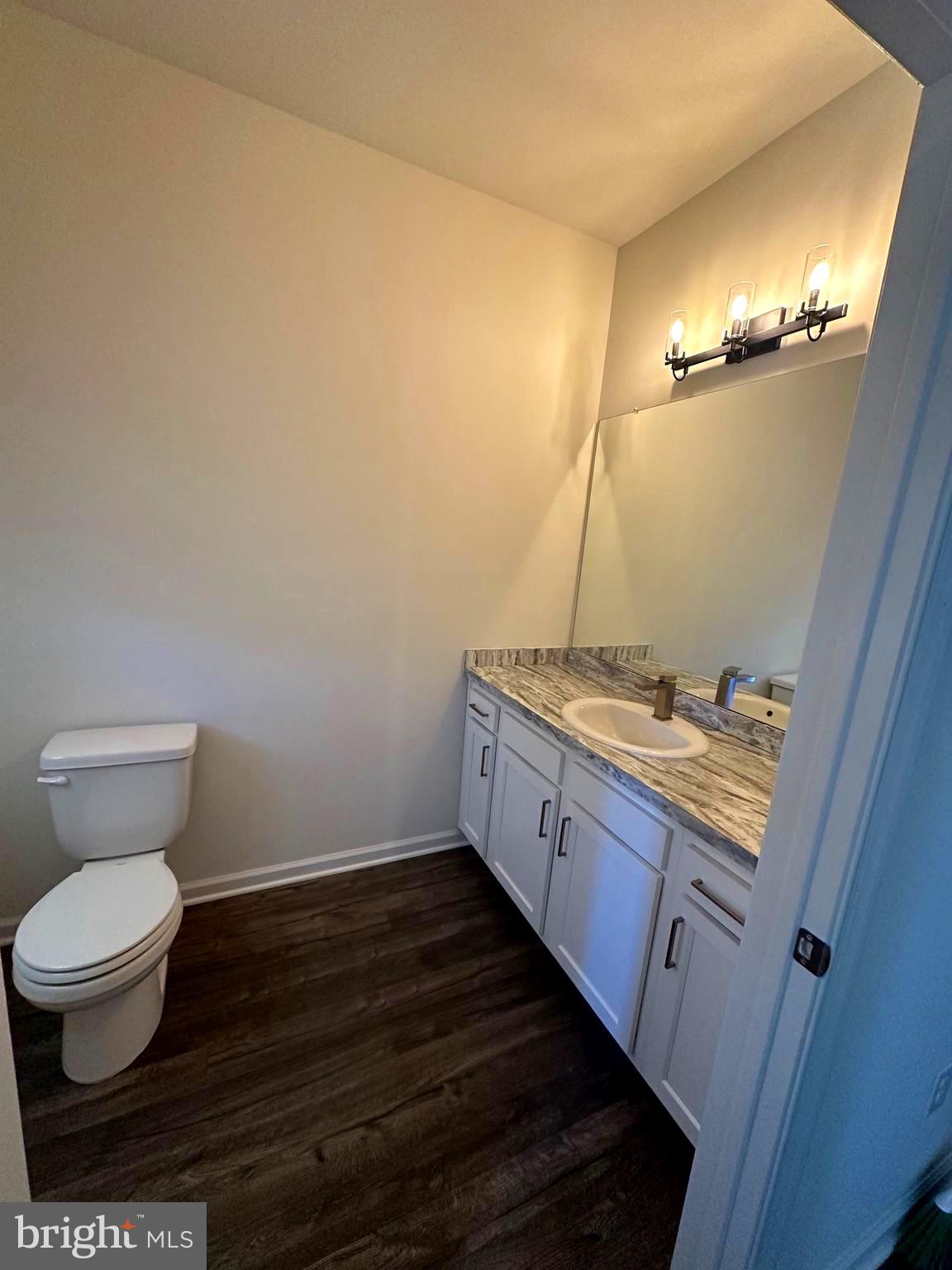 78 Tansboro Road Berlin, NJ 08009 - Photo 9 of 24 a bathroom with a granite countertop toilet and a sink