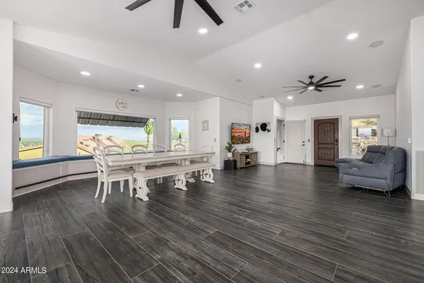 a kitchen with a sink and white cabinets