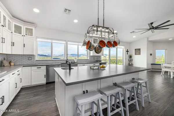 a hallway with washer and dryer