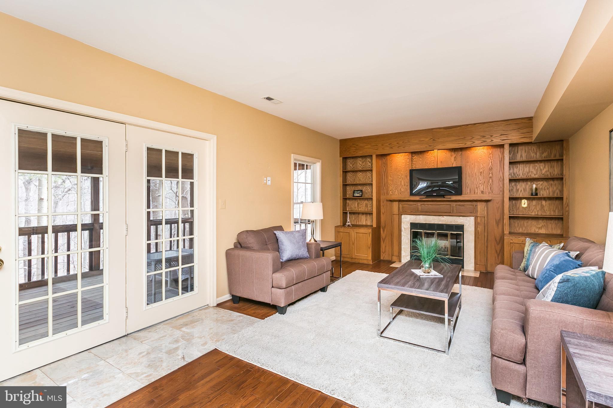 9307 Bellbeck Road Baltimore, MD 21234 - Photo 18 of 58 family room with fireplace