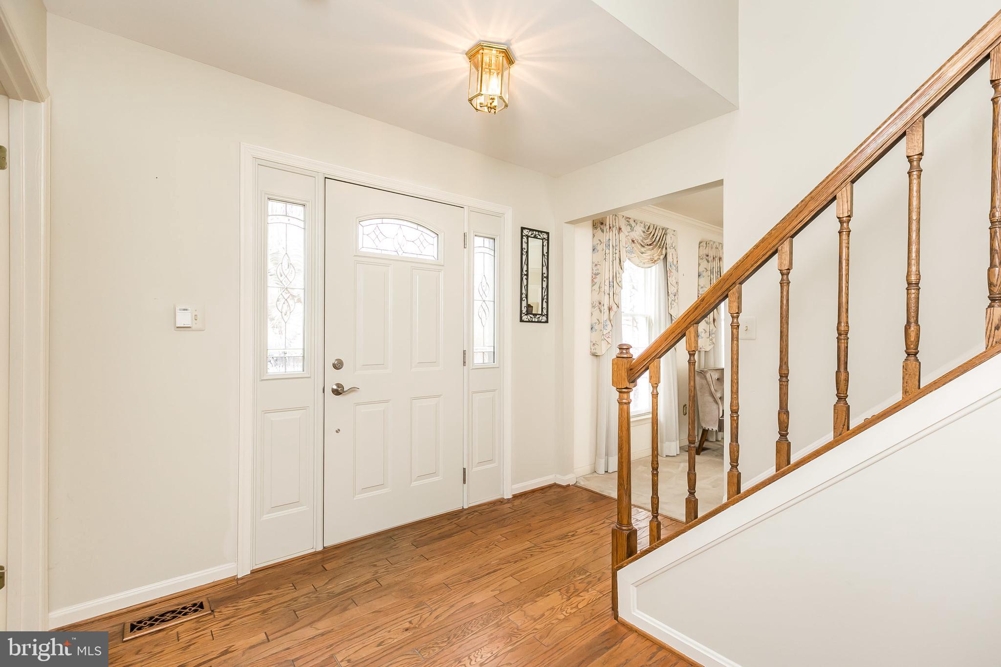 9307 Bellbeck Road Baltimore, MD 21234 - Photo 5 of 58 Foyer with hardwood floors