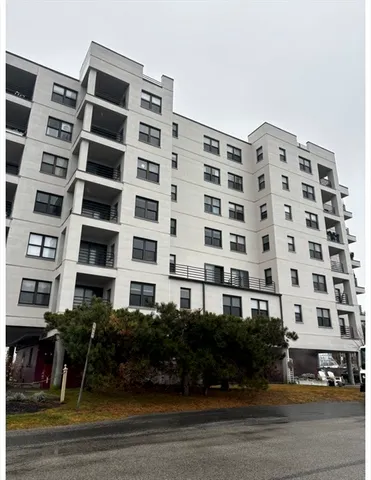 a view of a building with a garden
