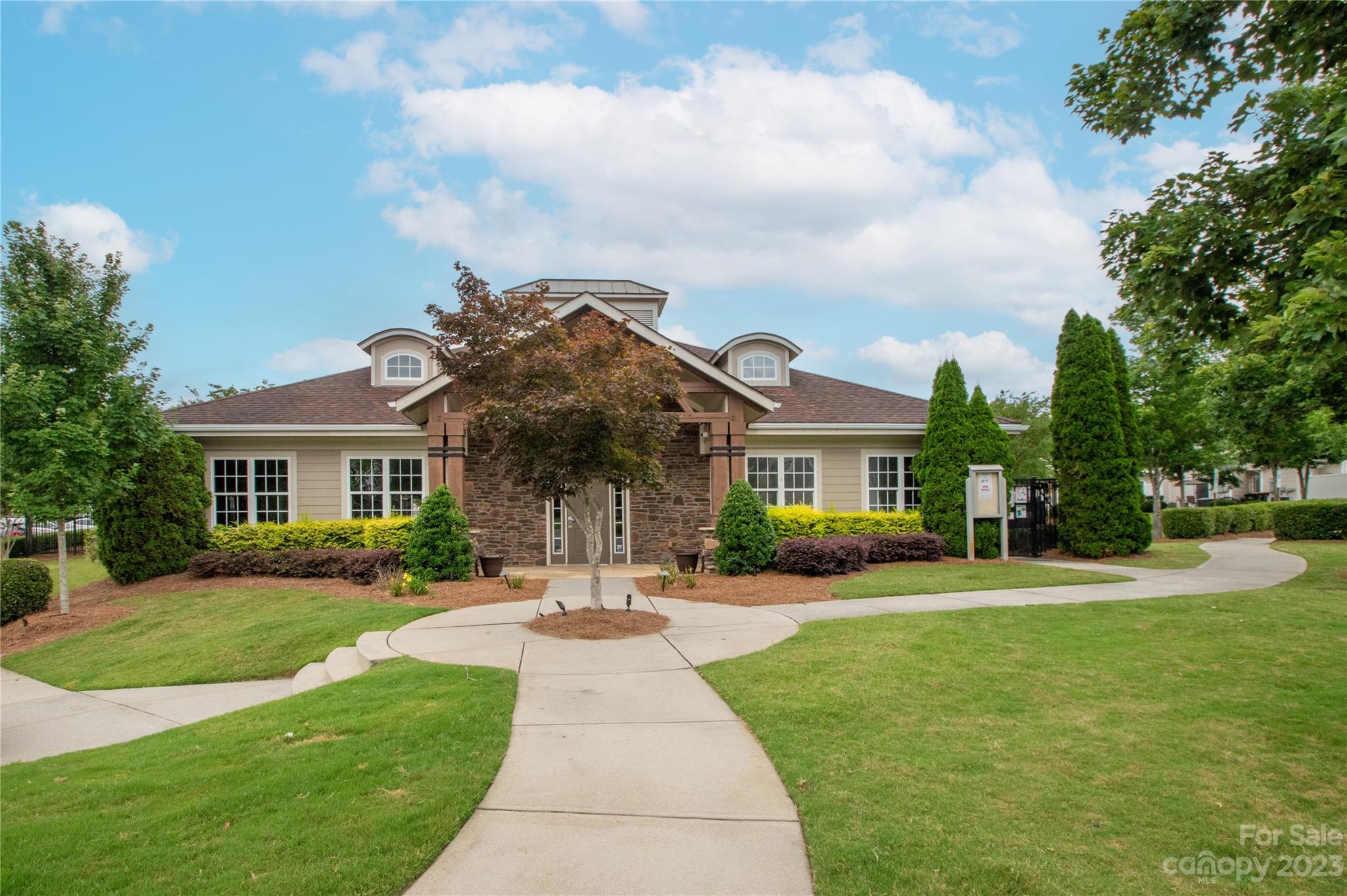 489 Hunters Dance Road Fort Mill, SC 29708 - Photo 30 of 36 a front view of a house with a yard and trees