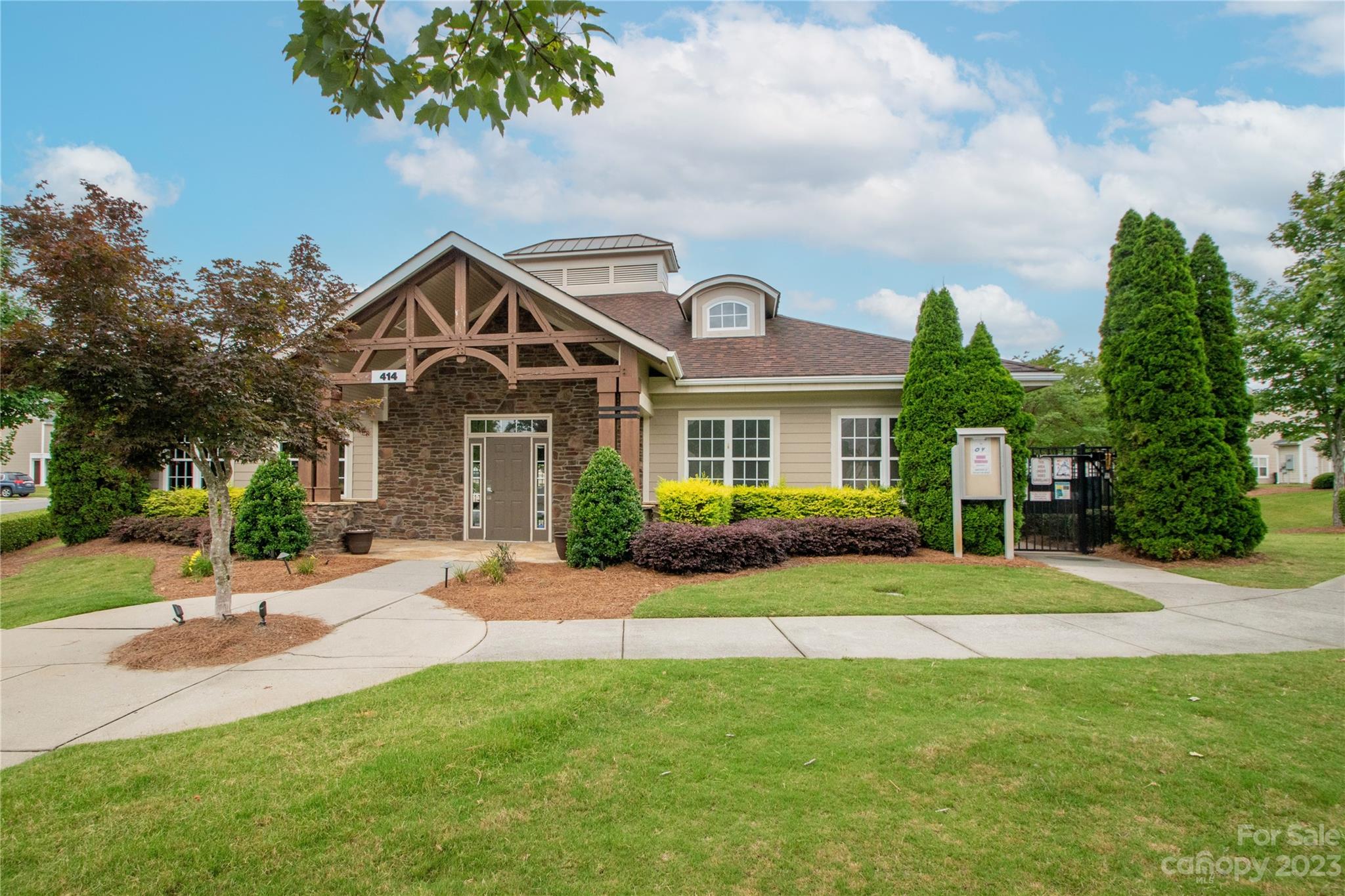 489 Hunters Dance Road Fort Mill, SC 29708 - Photo 31 of 36 a front view of a house with a yard