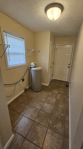 a view of a porch with wooden floor