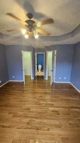 a view of a living room and kitchen