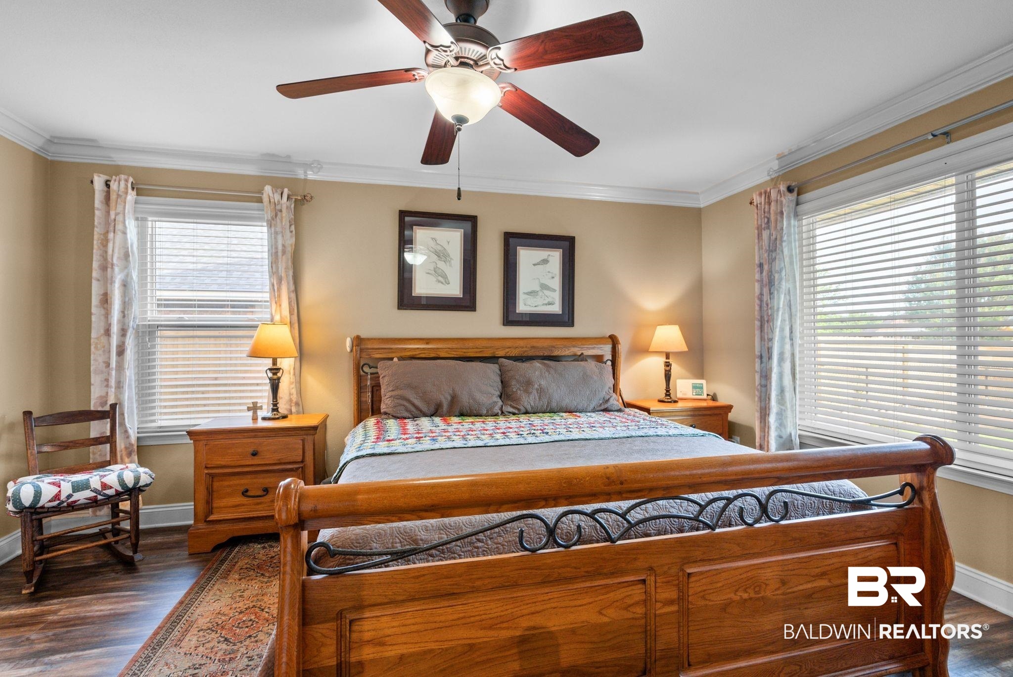 562 Vestige Mews Foley, AL 36535 - Photo 25 of 54 Interior room featuring wood-finish flooring and crown molding