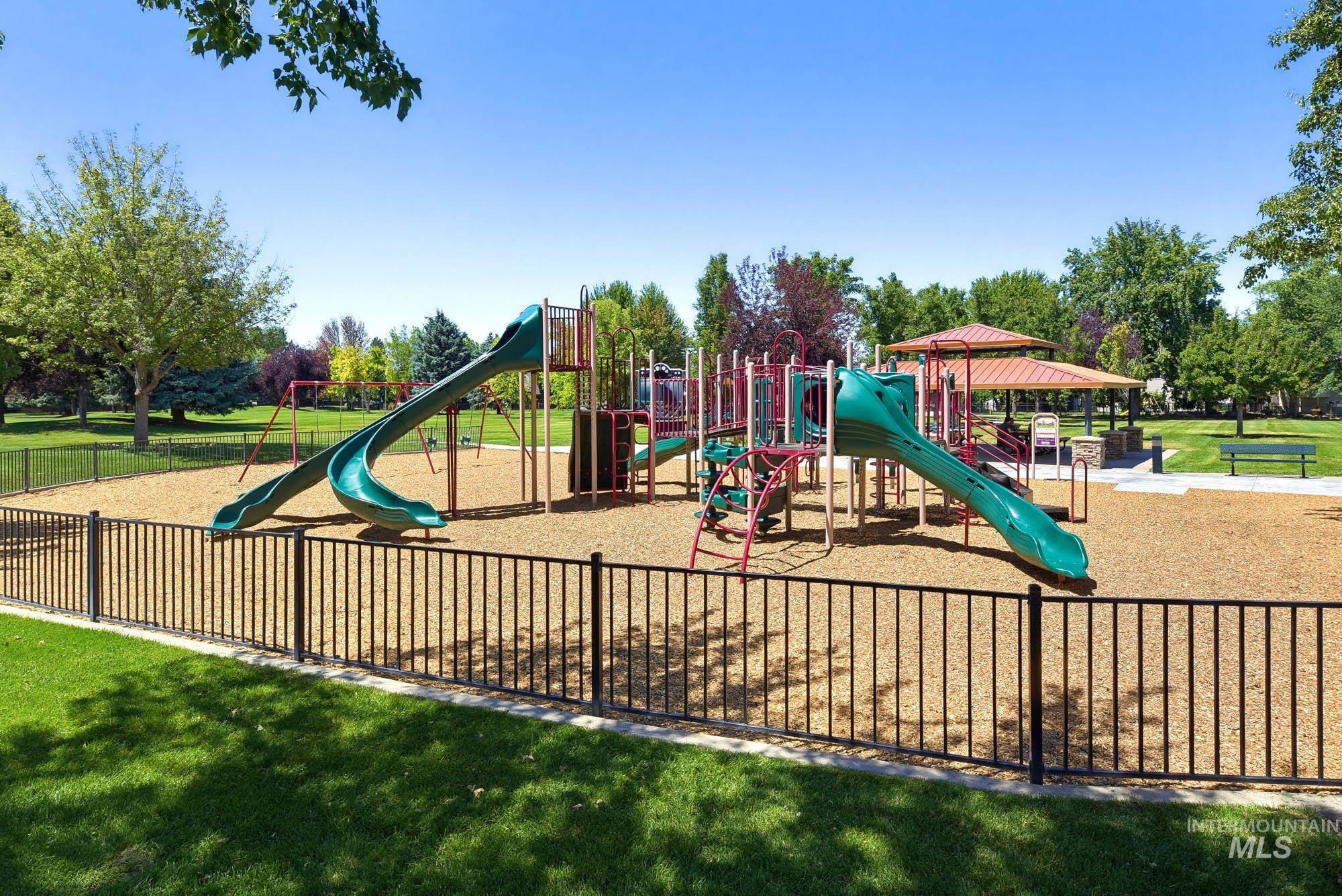 2172 West Cedar Grove Street Meridian, ID 83646 - Photo 46 of 49 Community playground featuring multiple slides and swings