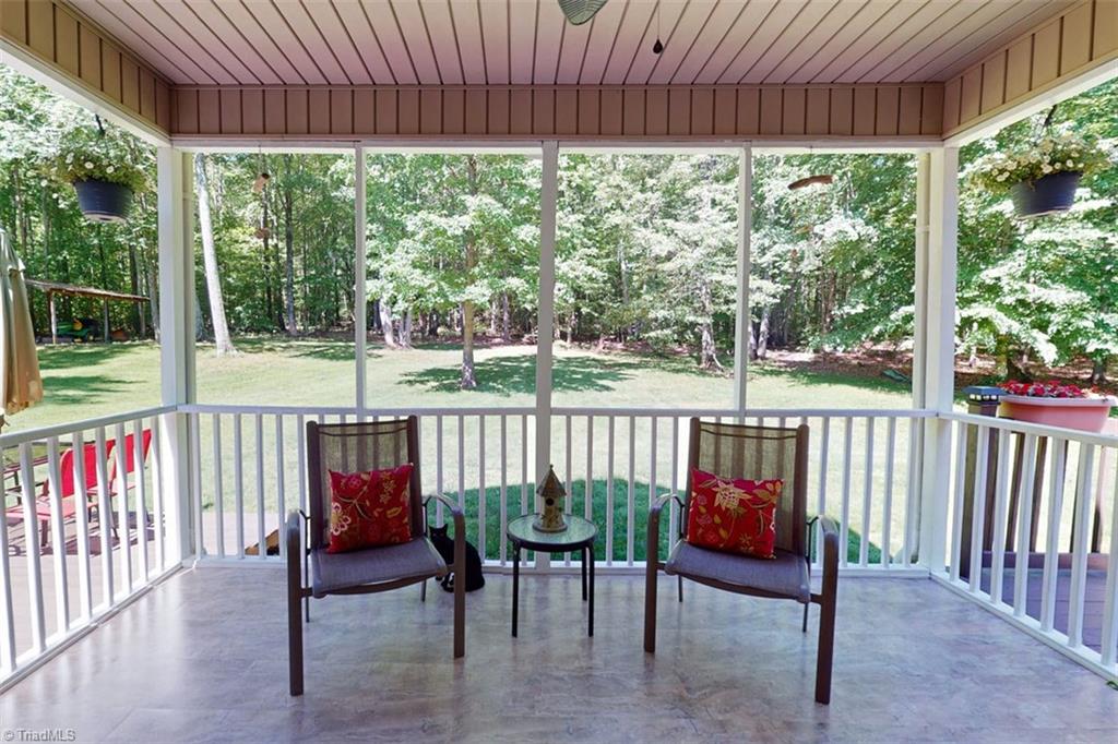 434 Rabbit Farm Trail Advance, NC 27006 - Photo 15 of 39 Covered back porch with new waterproof flooring.