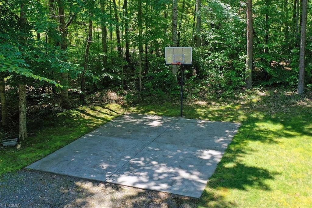 434 Rabbit Farm Trail Advance, NC 27006 - Photo 32 of 39 Concrete pad with basketball goal.