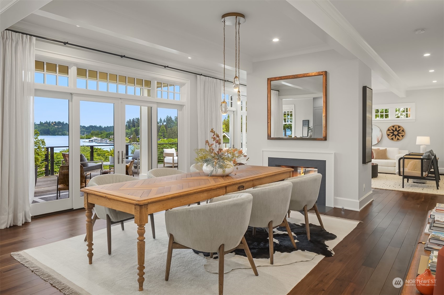 7270 North Mercer Way Mercer Island, WA 98040 - Photo 14 of 40 a view of a dining room with furniture window and wooden floor
