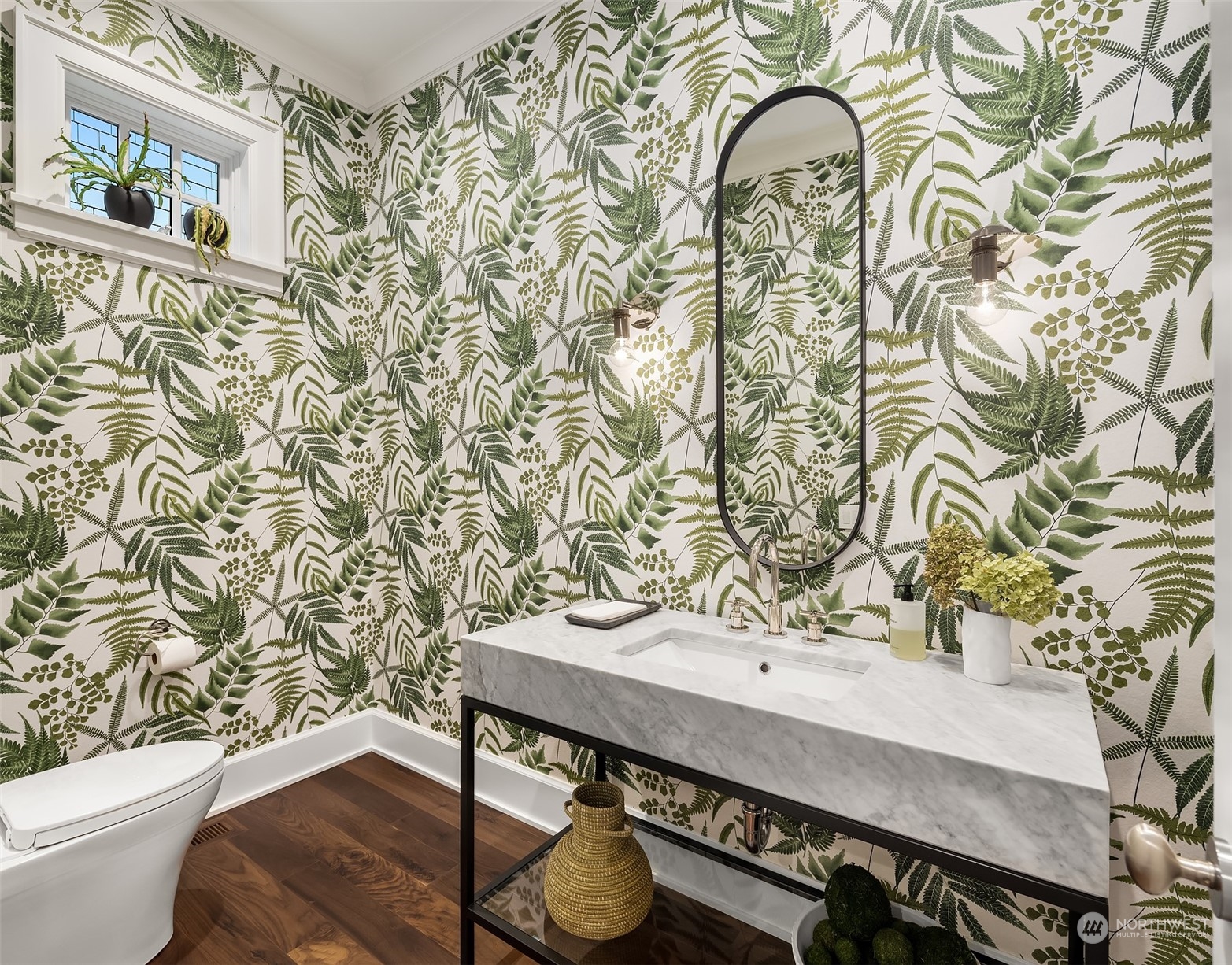 7270 North Mercer Way Mercer Island, WA 98040 - Photo 23 of 40 a bathroom with a sink and a mirror